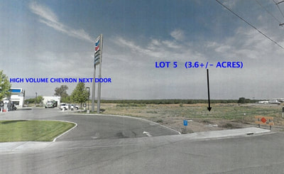 A google street view of a parking lot and a gas station.