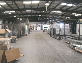 The inside of a warehouse with boxes and boxes.