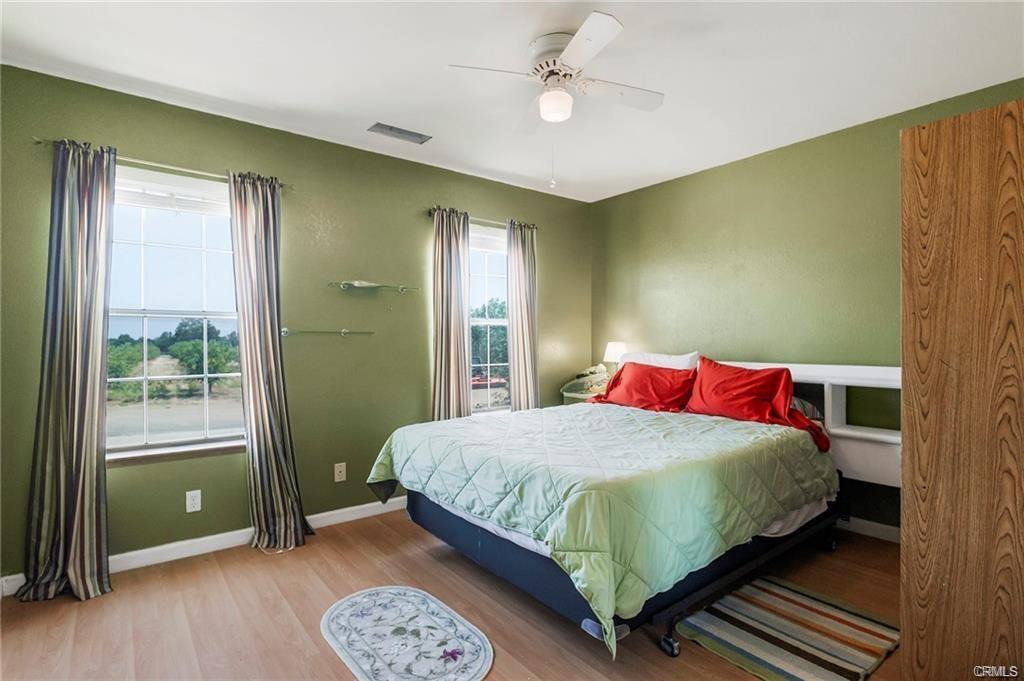 large bedroom with green walls