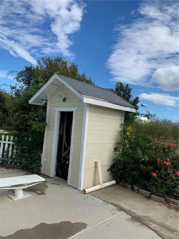 small shed by pool