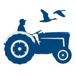 Navy blue icon of man riding a tractor with birds in the sky